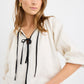 Subliminal Cream Black Trim Linen Relaxed Top